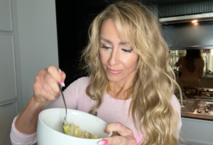 woman over 50 eating a high-protein meal for healthy aging